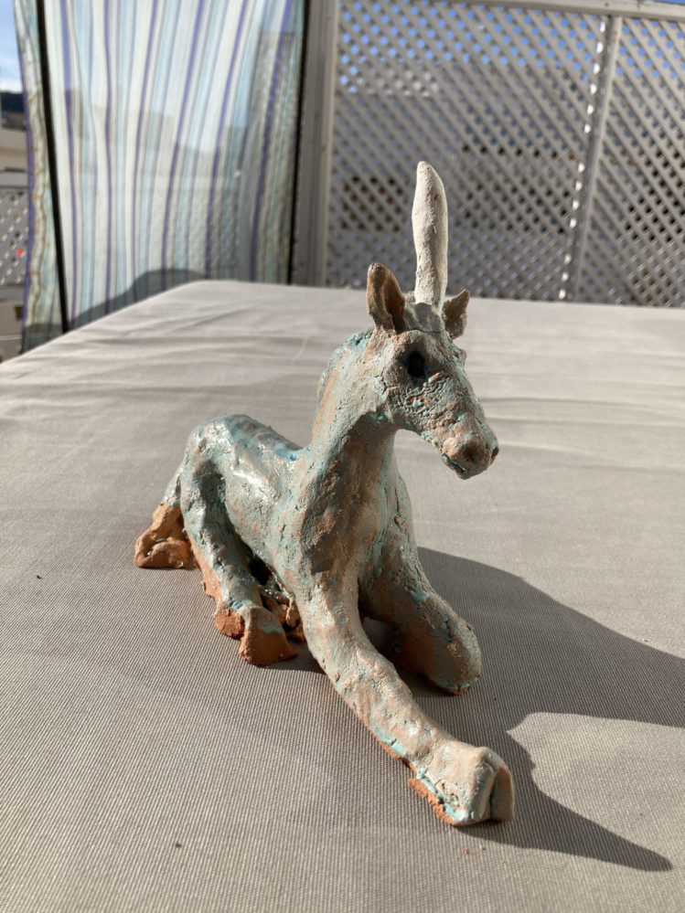 Unicorn : glazed ceramic , height 20cm length 25 cm